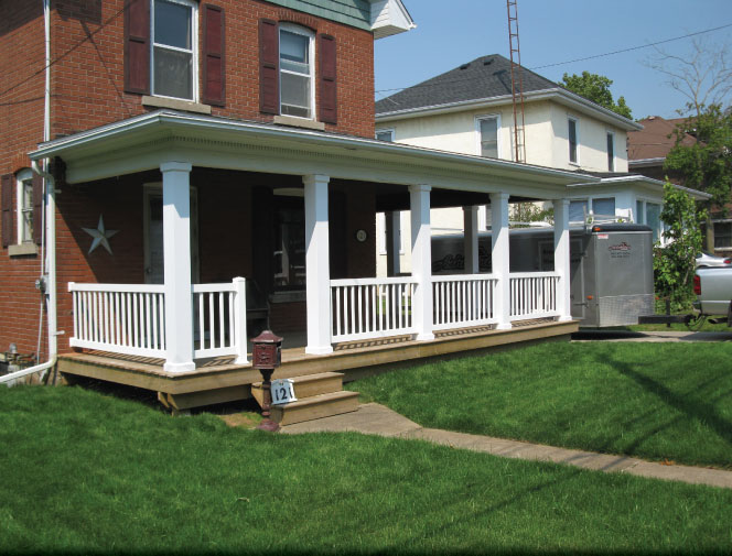 Posts are capped in pine & vinyl railings are installed.