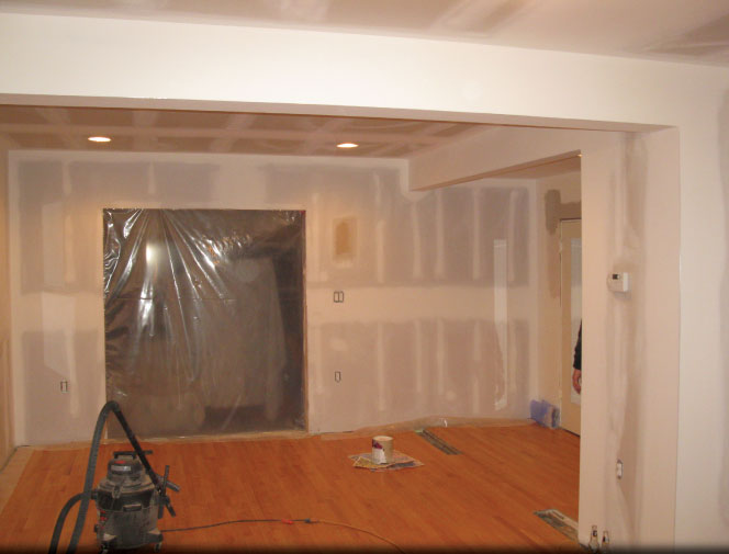 Doorway moved. Room drywalled & taped. Ready for paint.